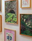 Gallery wall of different portrait framed wall art prints