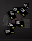 Black cards with 'The Gift of Art' text on a dark background