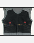 Art print of a black tank top with red floral embellishments on a white background