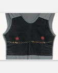 Art for fashion lovers of a black sleeveless top with red floral embellishments in a white frame