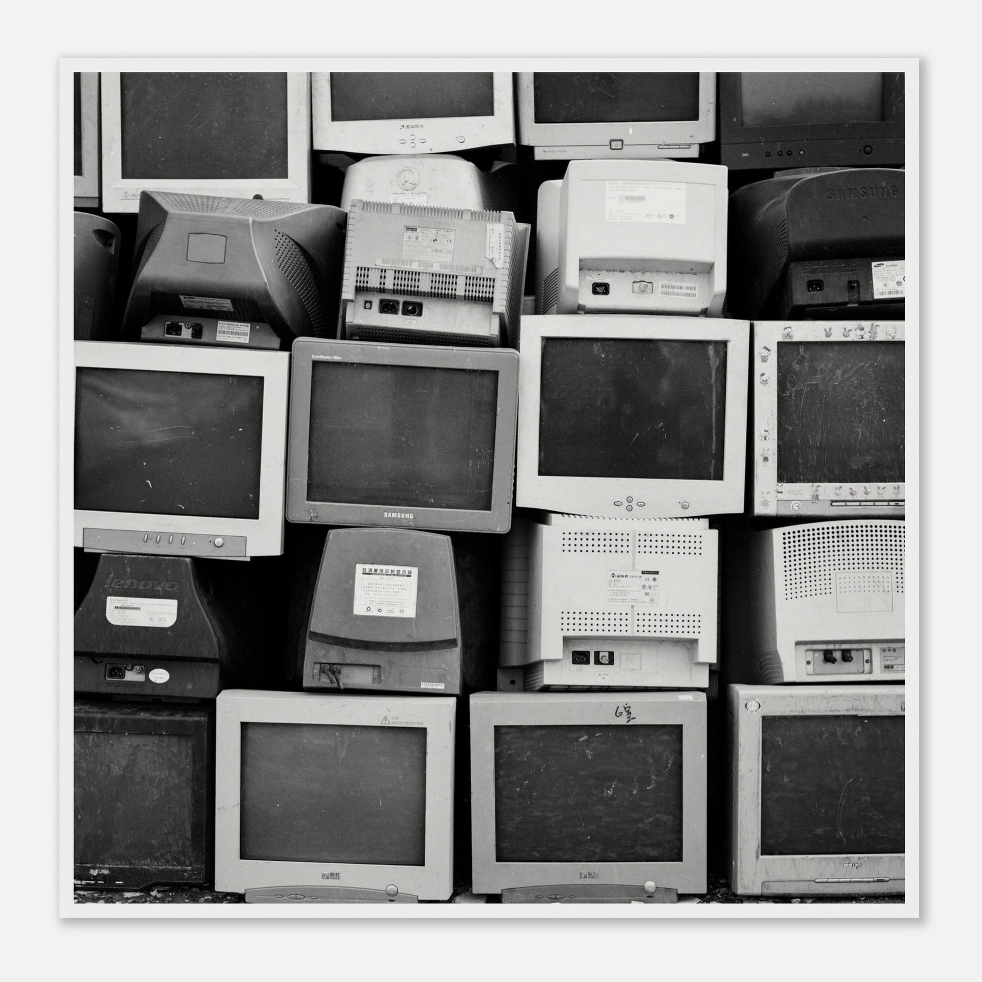 Black and white framed art print of a photo of a stack of vintage computer monitors