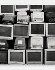 Black and white framed art print of a photo of a stack of vintage computer monitors