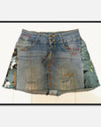 Framed art print of a denim skirt on a white background