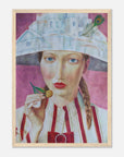 Framed artwork of a woman with a hat and a fruit, on a white background