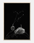Framed artwork of a person on a rock looking at a constellation in the night sky.