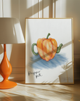 Framed artwork of a pepper pot with an orange lamp and wicker cabinet in the background.