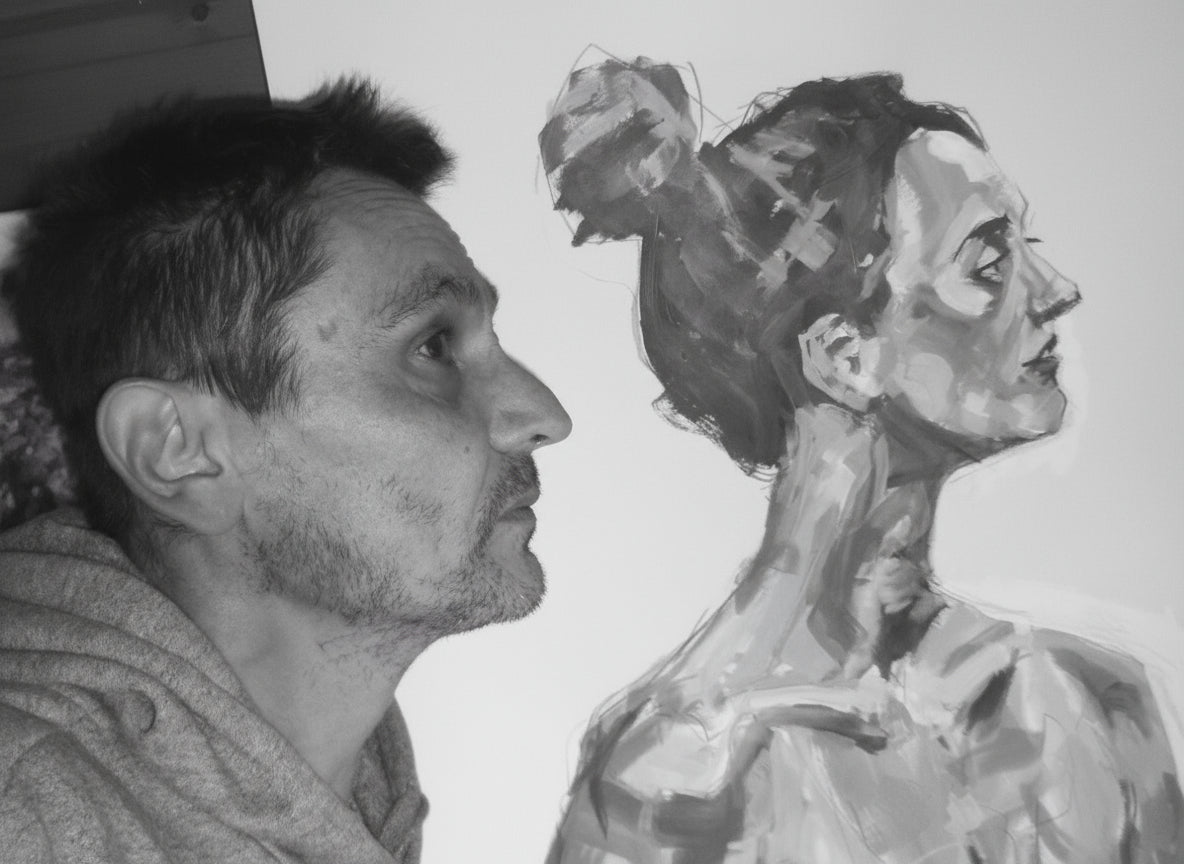 Man looking at a colorful painting of a woman's profile.