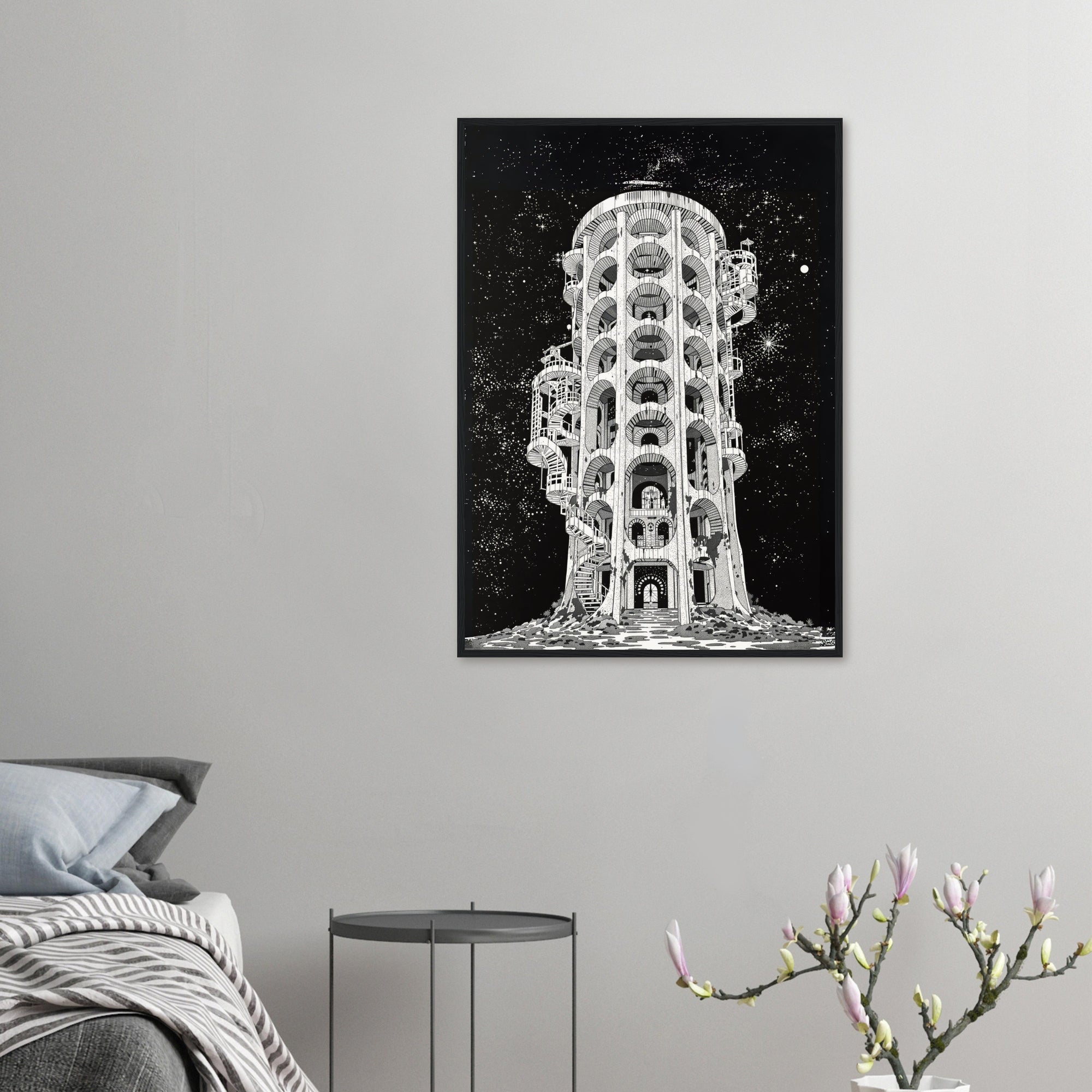 Framed artwork of a tower on a gray wall above a bed