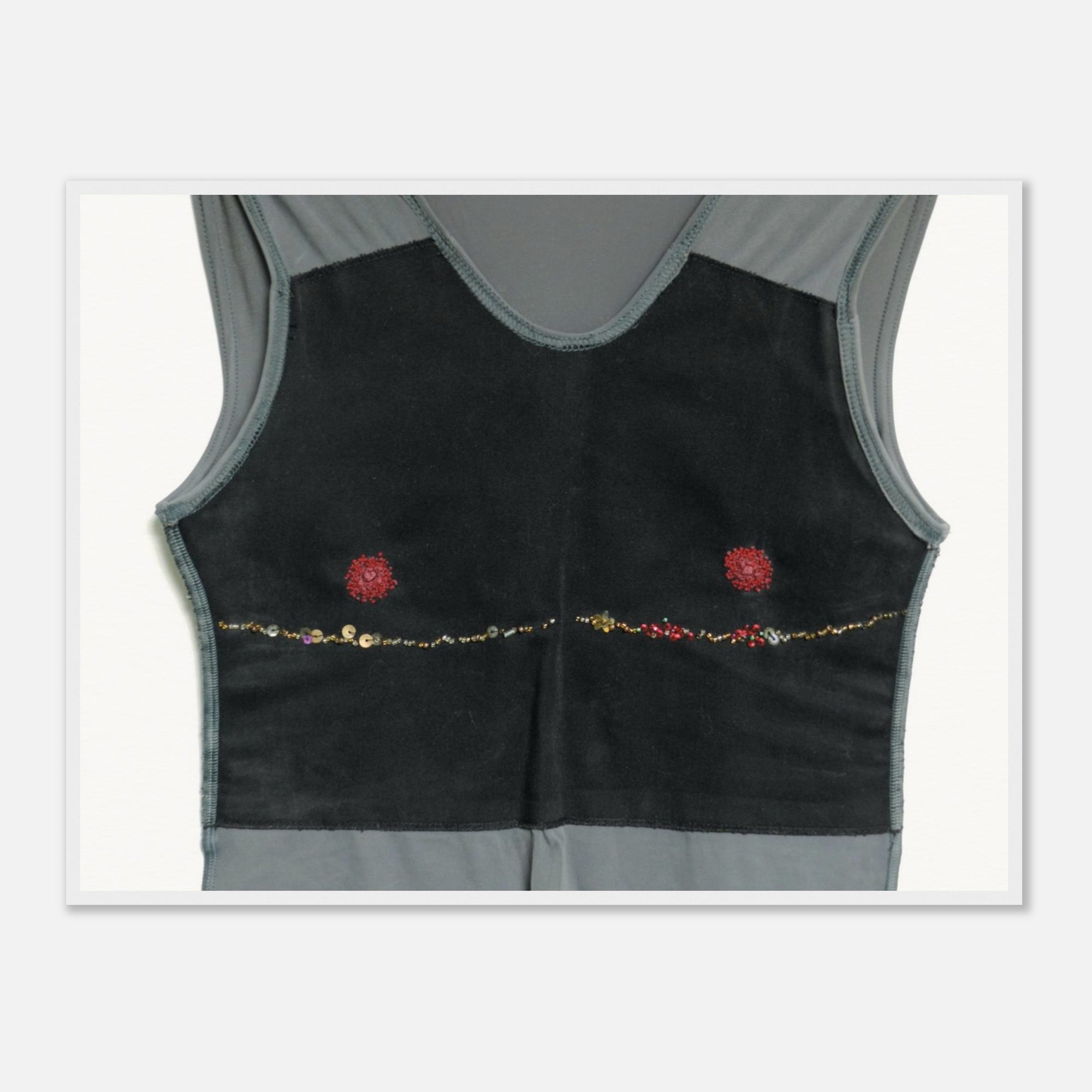 Art for fashion lovers of a black sleeveless top with red floral embellishments in a white frame