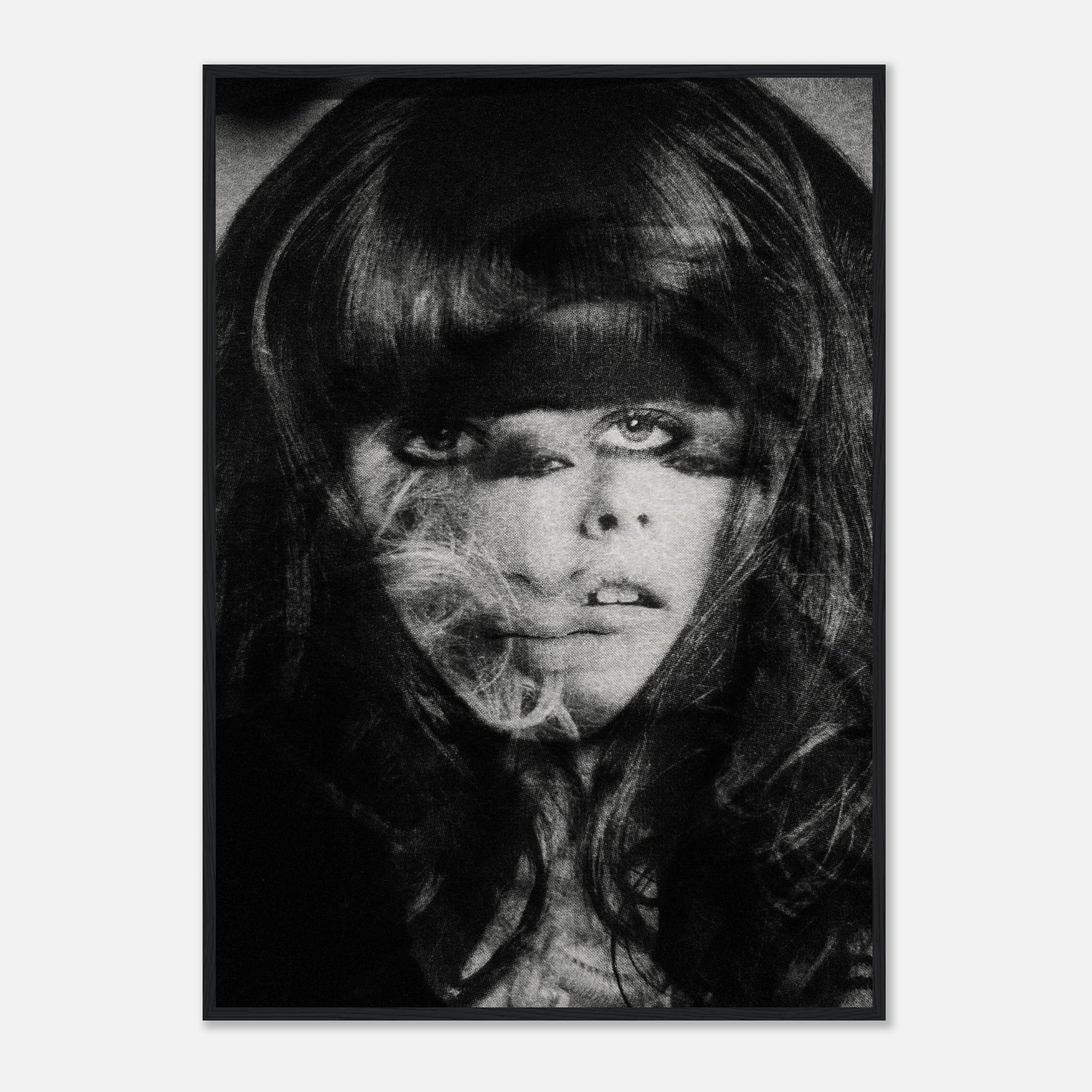 Black and white photo collage female portrait in a black frame.