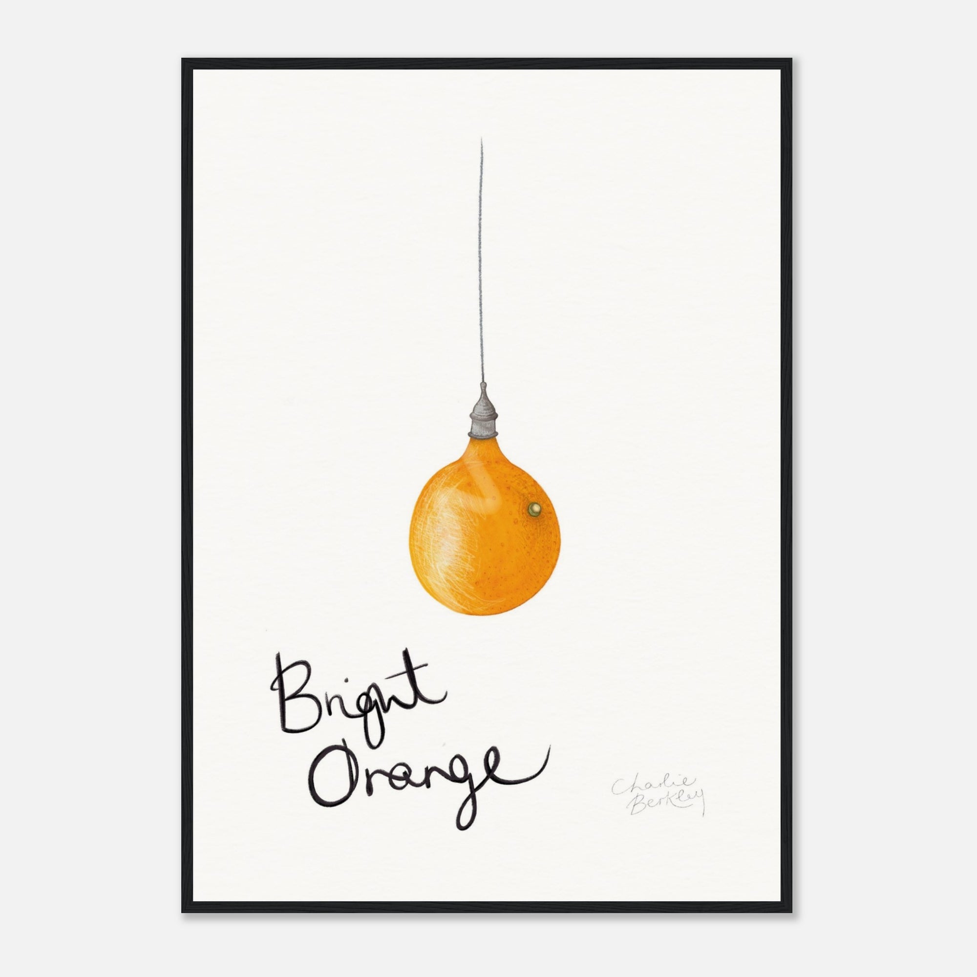 Framed artwork of a bright orange light bulb with 'Bright Orange' text on a white background