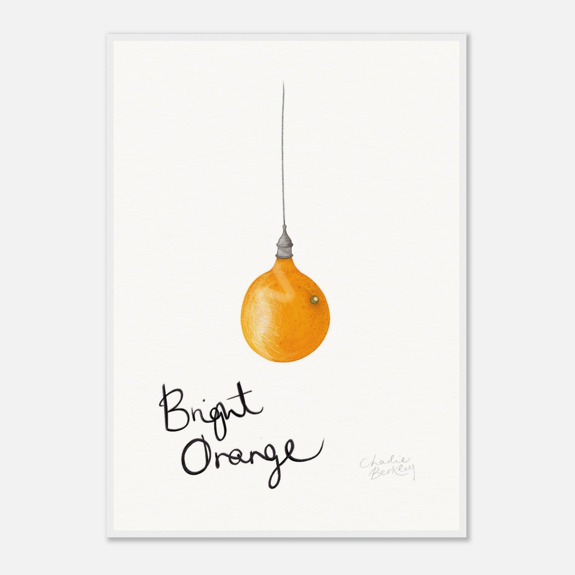 Framed artwork of a bright orange light bulb with 'Bright Orange' text on a white background in a white frame