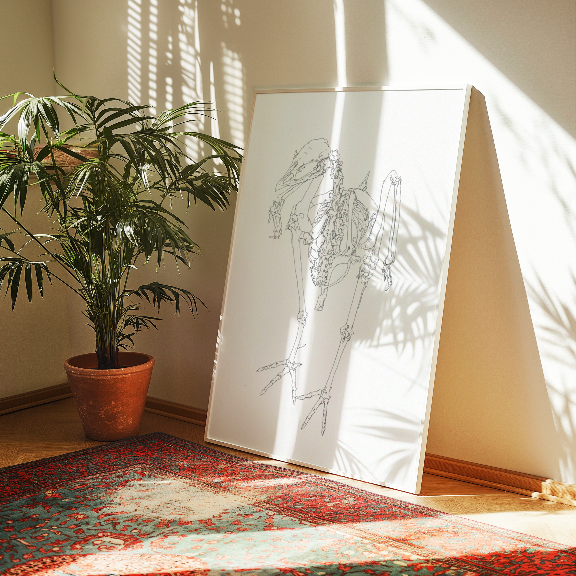 Room interior with a plant, rug, and large white art print with a skeleton diagram.